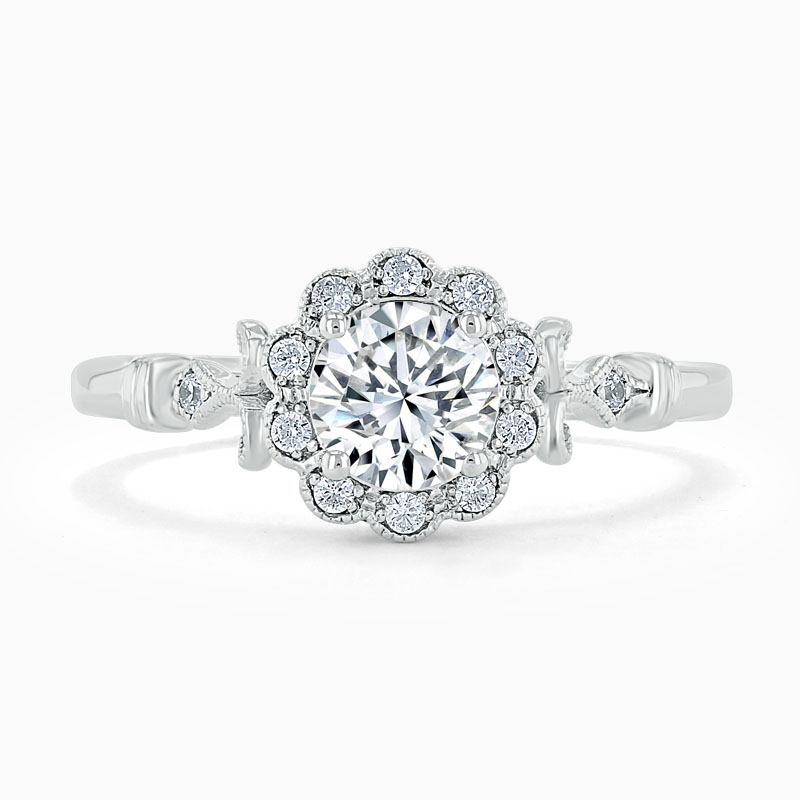 18ct White Gold Round Brilliant Flower Halo Engagement Ring