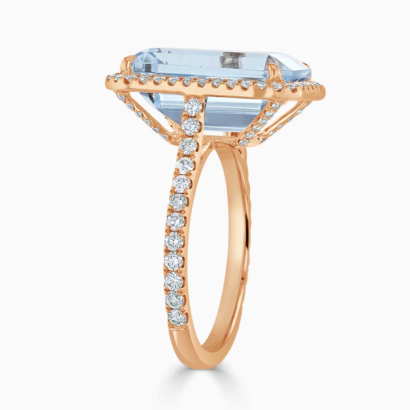 18ct Rose Gold Emerald Cut Blue Topaz & Diamond Halo Ring