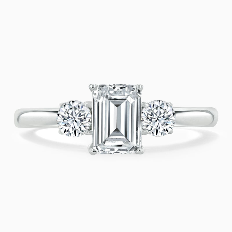 18ct White Gold Emerald Cut 3 Stone with Rounds Engagement Ring