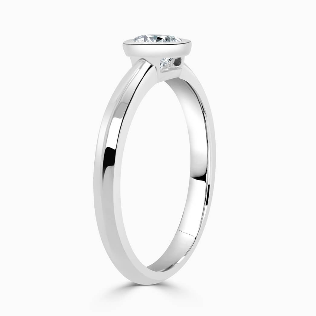 Platinum Round Brilliant Rubover Engagement Ring