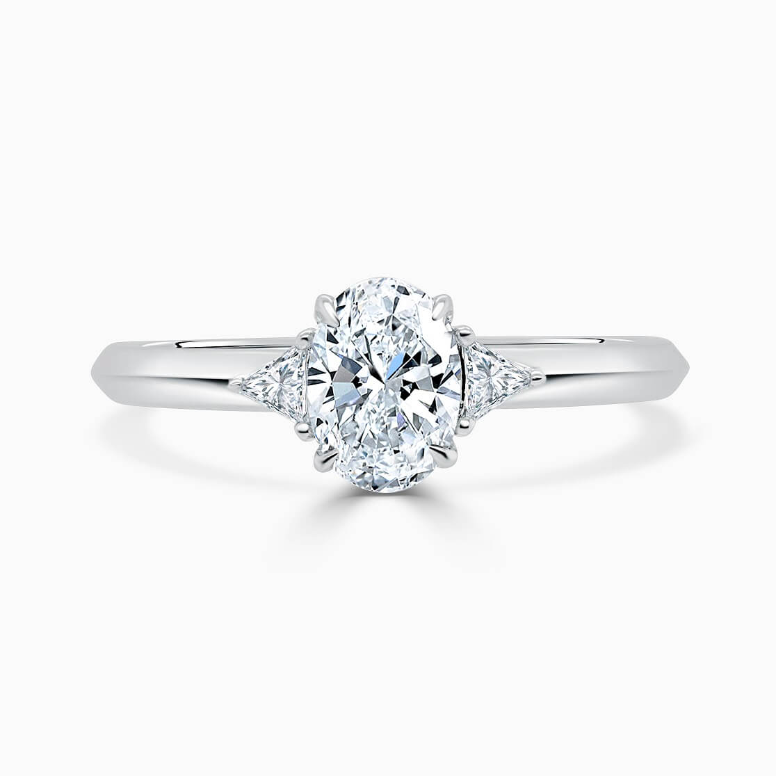 Platinum Oval Shape 3 Stone With Trillions Engagement Ring