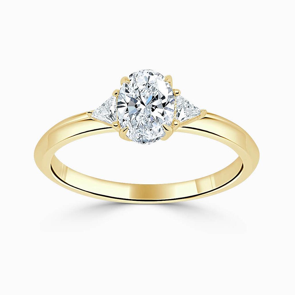 18ct Yellow Gold Oval Shape 3 Stone With Trillions Engagement Ring