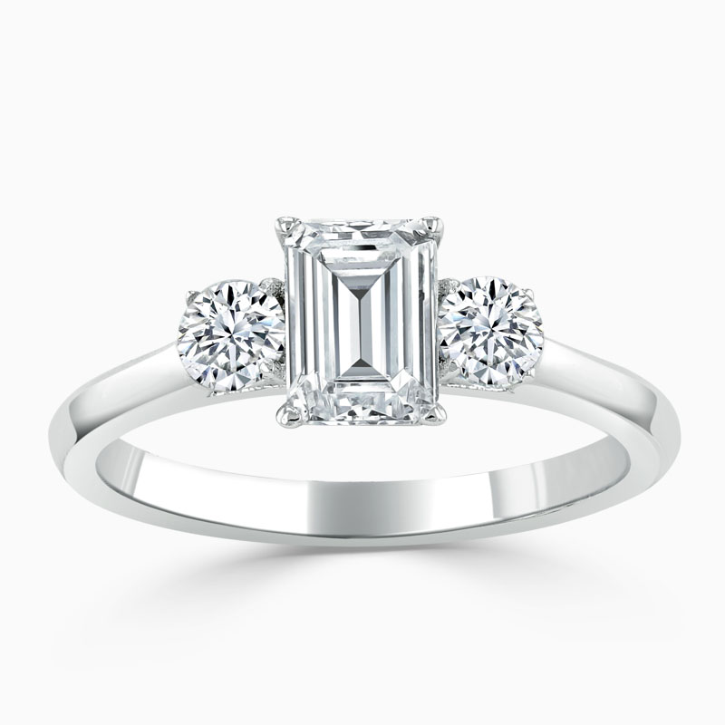 18ct White Gold Emerald Cut 3 Stone with Rounds Engagement Ring