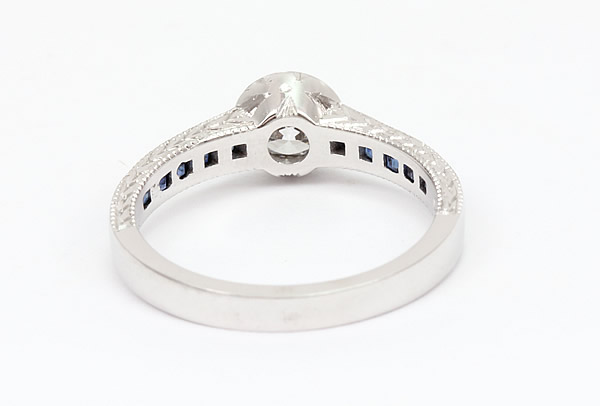 diamond and sapphire bezel engagement ring