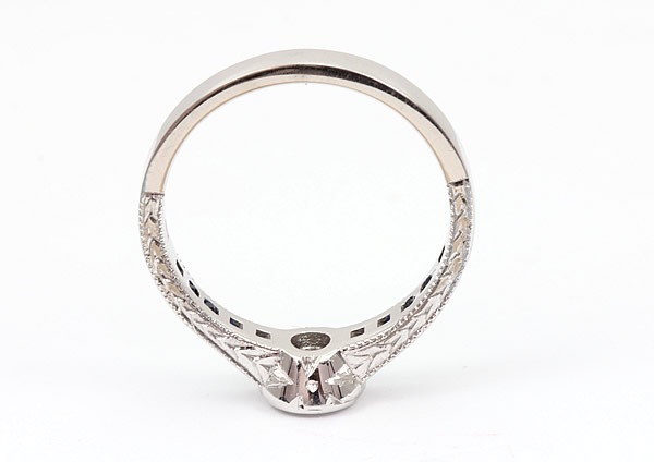 diamond and sapphire bezel engagement ring