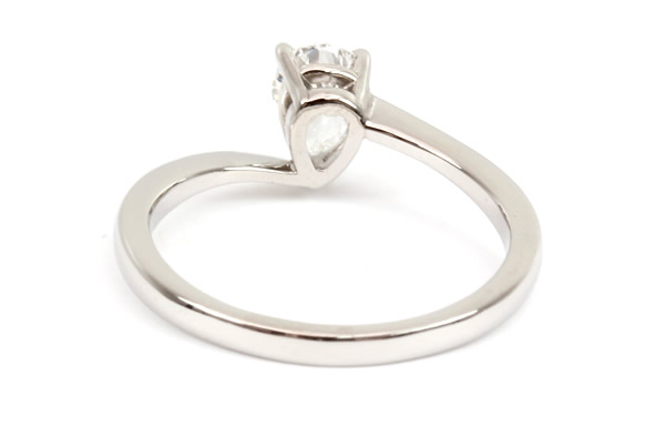 pear shaped cross over diamond engagement ring 