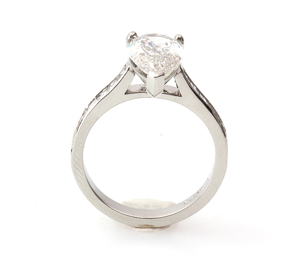 pear shaped diamond engagement ring with diamond set shoulders 6