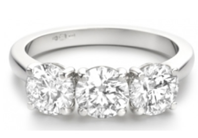 round diamond three stone engagement ring