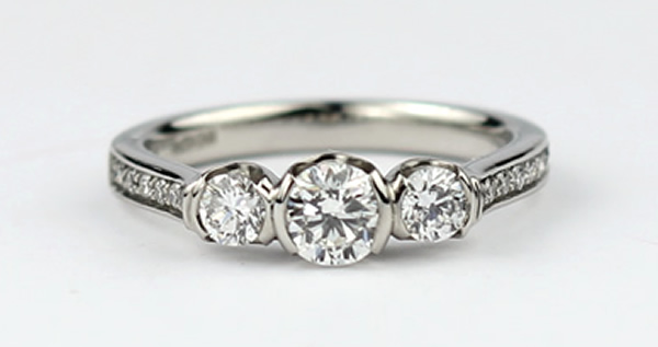custom made three stone diamond ring