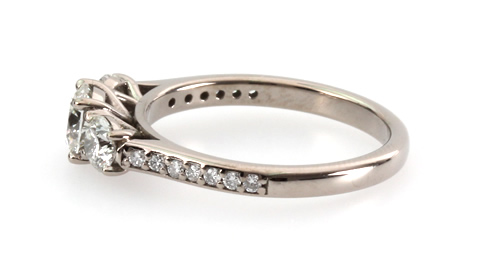 three stone diamond engagement ring with diamond set shoulders 2