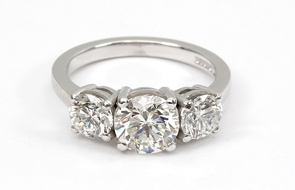 three stone round diamond engagement ring 